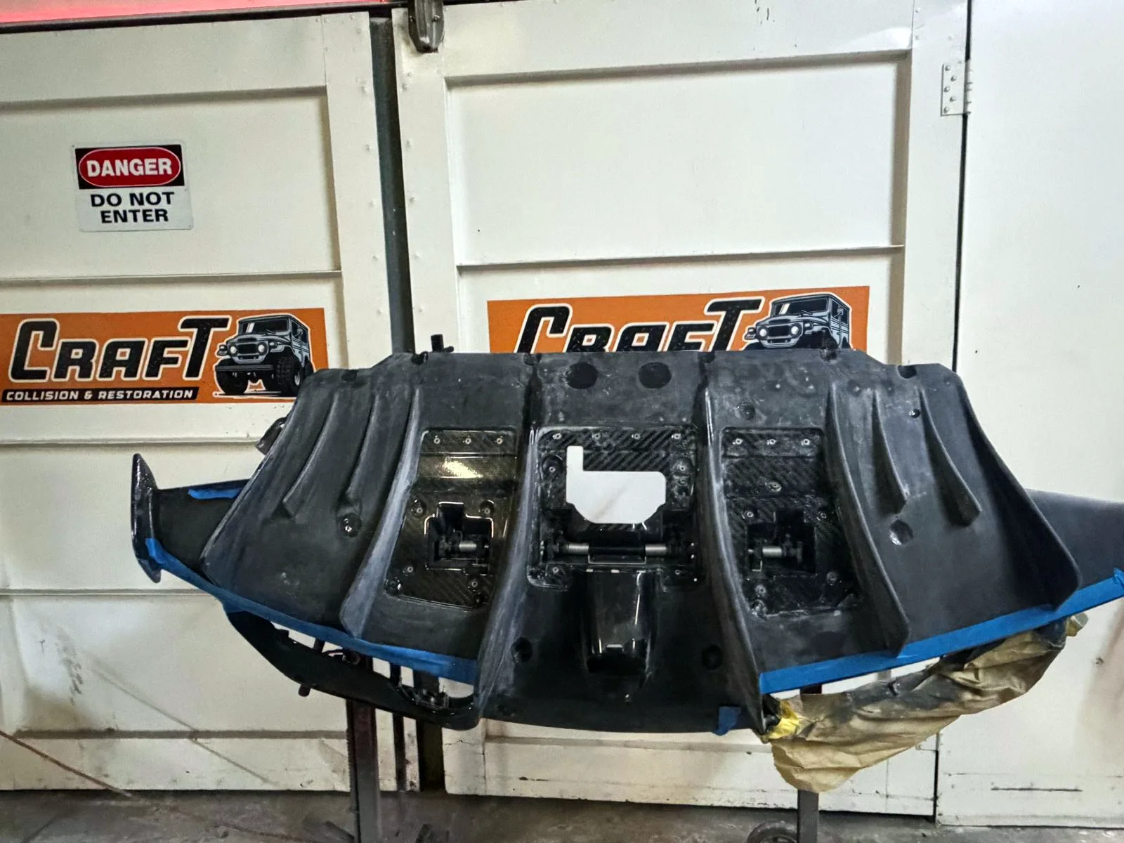 Large carbon fiber rear diffuser fabricated in house at Craft Collision