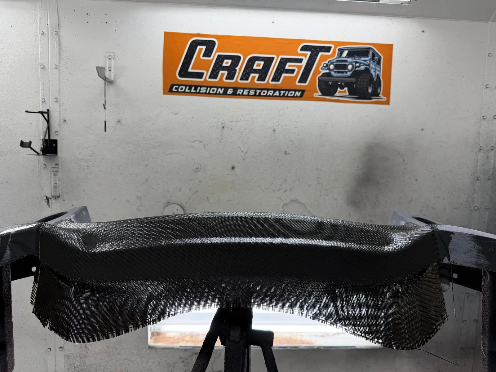 Carbon fiber rear wing fabricated in house at Craft Collision in Lake Worth Beach