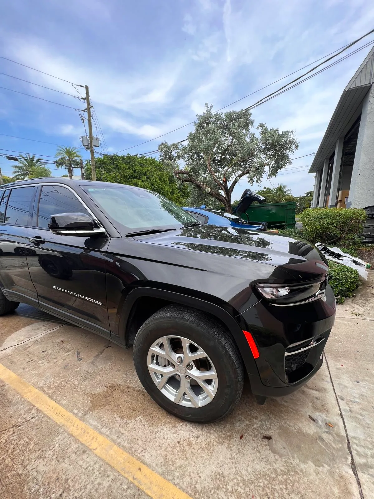 Black Jeep Grand Cherokee finished after front-end collision repair at Craft Collision